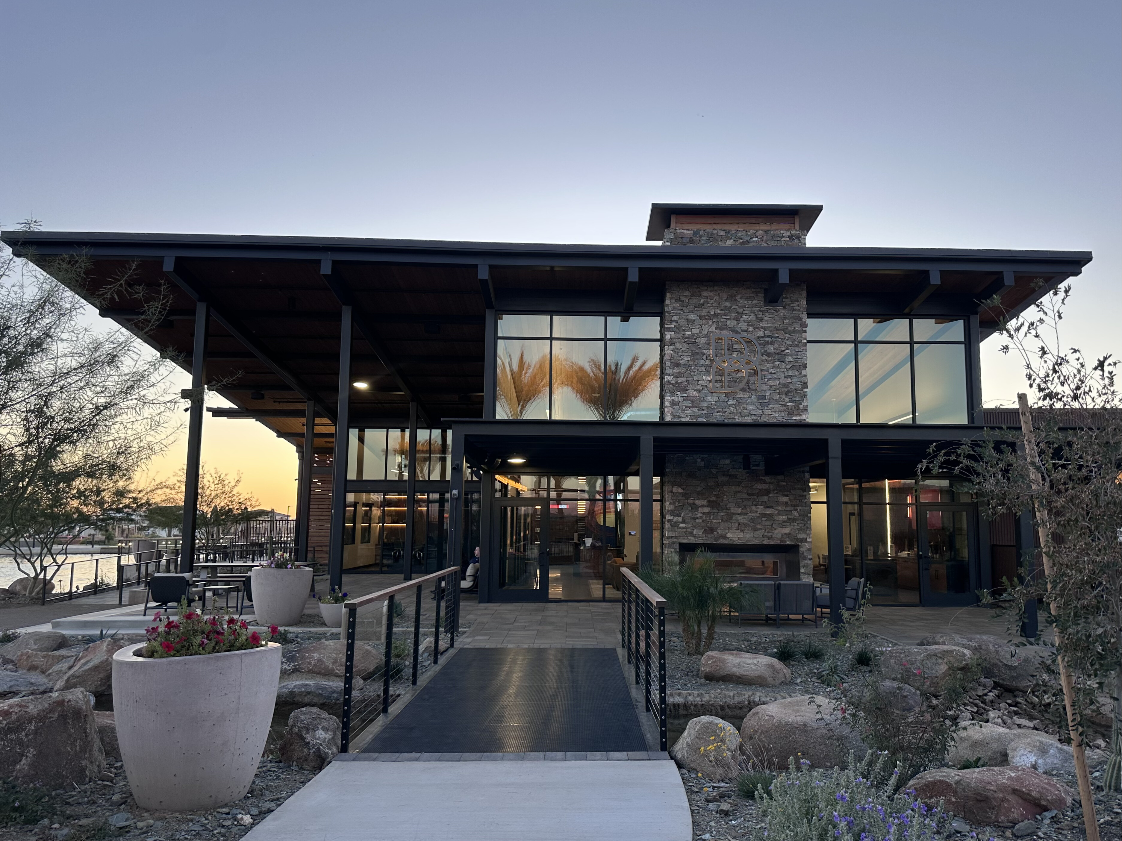 The Dutch Clubhouse at Blossom Rock — hay-barn inspired architecture on the lake at Painted Sky Park